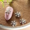 Joyería para uñas transfronteriza serie copo de nieve joyería de aleación arte de uñas navideño invierno simple diamante uña diy atuendo