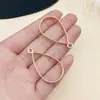 Marco abrasivo de gota de pegamento con figura geométrica de gota de agua de amor hueca de cuatro colores, accesorios de joyería de aleación DIY al por mayor