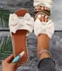 Sandalias chanclas de lazo de pedrería plana nuevas transfronterizas para mujer para exteriores color sólido ligeras de tela Amazon