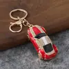 Chaveiro de carro esportivo com incrustação de diamantes em estoque, pingente criativo de modelo de carro em esmalte, acessório para bolsa feminina, item promocional