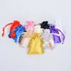Bolsa de joyería con cordón de bolsillo disponible, bolsa de regalo de Navidad de satén para embalaje de cosméticos para fiestas