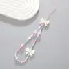 Nova corrente de celular com contas de urso e flores coloridas doces feita à mão faça você mesmo capa curta para celular corrente pendurada cordão de acrílico