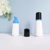 En stock botella cónica blanca de espuma de 60 ml, botella espumadora de PET para mousse de 100 ml, dispensador portátil de espuma facial