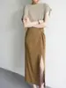 Falda Larga Hasta la Rodilla Jojoz Mostaza Textura Mate Diseño Cruzado Cintura Alta Abertura Lateral Prenda Inferior Femenina Elegante y a la Moda