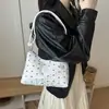 La popular bolsa de mano para dumplings de estilo fresco de este año para mujer, nuevo modelo de otoño 2026, elegante bolso de hombro con lazo, bolso de moda para el antebrazo