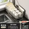 El fabricante suminista un escurridor de cuenco para utensilios de cocina y vajilla, un escurridor de almacenamiento para encimeras del hogar y un estante de almacenamiento para cuchillos y tablas de cortar.