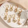 Moda Europea y Americana Sencillos Personalizados Populares Pendientes Nicho Acero Inoxidable Chapado en Oro de 18K Microincrustados Circonita Pendientes de Letra para Mujer