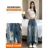 Jeans vintage de talla grande con rotos y dobladillo curvo para mujer, al por mayor, en stock, pantalones rectos de pierna ancha, holgados, de cintura alta, para adelgazar, de verano