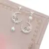 Aretes de borla de perla de luna rosa estilo francés para mujer, diseño de nicho, elegantes y con estilo, nuevos aretes 2026