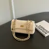 Bolso pequeño de patrón de rombos, nueva colección otoño 2026, bolso cruzado liso retro y elegante, bolso de hombro cuadrado pequeño chic y único