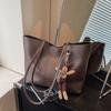 Bolsa de ombro feminina de alta capacidade retrô de alta qualidade estrangeira 2024 nova moda bolsa de ombro para viajante popular bolsa tote