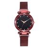 Puesto de calle suministro celebridad de internet TikTok mismo estilo reloj perezoso para mujer imán absorción de hierro moda cielo estrellado reloj venta al por mayor