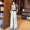 Pantalones de chándal de otoño para mujer, estilo americano, bloques de color, cintura elástica, patchwork, con remaches, dobladillo curvo, cintura alta, cordón y diseño casual de pierna ancha
