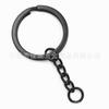 Fabricantes de fuentes suministran llavero de bronce con cadena Llavero negro Llavero de oro KC con anilla