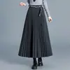 Falda plisada moderna y elegante para mujer, nuevo estilo otoño e invierno 2026, de cintura alta, adelgazante, de longitud media, versátil y elegante.
