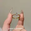 Anillo de Dedo Usado Wind Light Lujo Brillante Ovalado con Pedrería Exquisito Moderno Elegante Temperamento Versátil Personalidad Sensación de Alta Gama
