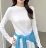 Camiseta básica de algodão modal com gola redonda, ombros normais e mangas compridas para mulheres, novo modelo outono e inverno 2026, alta elasticidade, caimento justo, adequada para usar em camadas, disponível para atacado