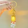 Llavero luminoso Guofeng colgante para coche mochila pareja regalo pequeño llavero al por mayor llavero de metal retro
