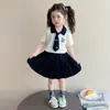 Conjunto de Academia de Verano para Niñas Ropa de Verano para Bebés Niños Nuevo Estilo Policía Conejo Polo Manga Corta Falda Plisada Conjunto de Dos Piezas