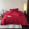 Juego de cuatro piezas de algodón de fibra larga de alta gama en color rojo para bodas, funda nórdica de jacquard de algodón puro estilo chino nuevo, ropa de cama festiva para bodas