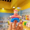 Popular llavero de oso de arcilla de colores electrochapado colgante para pareja femenina llavero colgante de bolsa adornos lindos de dibujos animados exquisitos