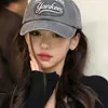 Uñas de hueso de oreja de estilo frío de red roja nicho japonés y coreano, pendientes de gancho de doble línea simples elegantes montados en la parte posterior para mujer