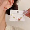 Conjunto de Pendientes de Tres Piezas Estilo Coreano, Moderno y Sencillo, con Incrustaciones de Diamantes, Bloques de Color y Mariposa Roja para Mujer, Pendientes Versátiles de Lujo Ligero Exquisito al por Mayor