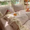 Fufu de leche pequeño floral terciopelo de leche cálido juego de cuatro piezas estilo coreano encaje franela funda de edredón sábana 1.5m falda de cama 4
