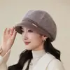 Nueva colección de otoño e invierno estilo coreano: Gorro de punto de color liso, gorro cálido y protector para los oídos para mujeres de mediana edad y mayores, adecuado para andar en bicicleta