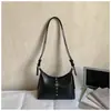 Bolso de mano minimalista de nicho estilo coreano para mujer, nuevo bolso de hombro y cruzado de moda retro trendy primavera 2026