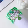 Europa y América. Pulsera Verde del Día de San Patricio Apilada con Cuentas de Arcilla Suave, Decoración de Colgante Hecho a Mano de Trébol de Cuatro Hojas de Buena Suerte