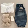 Pantalones para Niños 2026 Ojos Bizcos Otoño Nuevas Llegadas Niños y Niñas Jeans de Oso Pequeño 3D Pantalones de Zanahoria Versátiles para Bebé