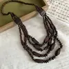 Colar de contas de madeira irregular estilo boêmio retrô étnico corrente para suéter colar com senso de design de nicho