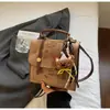Moda de Comércio Exterior Bolsa de Couro Camurça para Mulheres 2026 Nova Versátil Casual Bolsa de Mão Mochila Simples Multiúso Bolsa Transversal