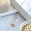 Colar Clássico de Trevo de Quatro Folhas em Aço Titânio Mais Vendido para Mulheres, Design de Nicho, Luxo Leve, Corrente de Clavícula Totalmente Cravejada com Zircônia Diamante
