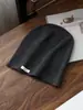 Gorro de lana de punto de color sólido retro japonés para mujer, gorro holgado cálido de invierno nuevo, gorro elegante para poner sin apretar