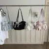 Bolso de axila negro de lunares para mujer 2026 nuevo de moda de alta gama ligero de nicho para ir al trabajo de gran capacidad