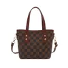 2025 Moda Verano Nuevo Bolso Pequeño Bolso Popular para Mujer Hombro Textura Portátil Nicho Bolso Cruzado Bolso Cubo