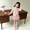 Conjunto de Suéter para Niña 2026 Nuevo Estilo Coreano Bloque de Color Chal Cardigan de Punto Moda Infantil Falda Plisada Conjunto de Dos Piezas