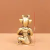 Latón Puro Creativo Figura Arrodillada de Sanxingdui Adorno Cultural y Creativo Artesanía de Latón Pequeño Adorno de Estilo Chino Pequeña Vajilla de Cobre