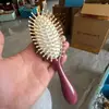 Pente de madeira de sândalo Phoenix com cabo redondo, almofada de ar, dentes grandes de bambu, dentes redondos, almofada de ar, redondo de tambor, almofada de couro nude, pente de massagem comum para a cabeça
