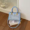Venta al por mayor transfronteriza 2026 Modelo nuevo Bolso de mano pequeño para mujer, Bolso de hombro versátil casual, Bolso cruzado simple para el día a día