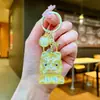 Tendencia Nacional Figura de León Dibujo Animado Llavero Colgante de León Mochila de Estudiante Adorno de Cristal Transparente Llavero al por Mayor