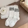 Nuevos calcetines de otoño e invierno para mujer, calcetines de estilo japonés lindos de oso de dibujos animados hasta la mitad de la pantorrilla con lazo y ribete de encaje, calcetines grises