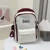 Mochila Escolar para Aluno do Ensino Fundamental Feminina Aluno do Ensino Médio Grande Capacidade Aluno do Ensino Fundamental Design de Nicho Retro Americano Mochila para Aluno do Ensino Médio