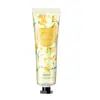 Nueva crema de manos nutritiva Han Ji con 10 tipos de fragancias florales y frutales 30g para hombres y mujeres, crema de manos hidratante anti-sequedad, generación de venta al por mayor