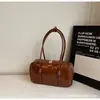 Bolsa de Almofada para Axila com Design de Nicho Feminina Nova Primavera 2025 Bolsa Boston Retrô Bolsa de Ombro Portátil para o Dia a Dia