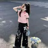 Conjunto de Verão Estilo Preguiçoso para Meninas 2026 Ursinho Cartoon Camisa POLO Laço Doce Calça Casual de Pernas Largas Conjunto de Duas Peças