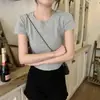 Camiseta de algodón acanalada de manga corta para mujer con hombros normales, cuello redondo, color liso, verano, dobladillo irregular, corte ajustado, top versátil, estilo ins