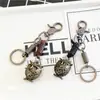 Personalidad creativa hecho a mano retro piel de vaca bronce búho llavero creativo pequeño regalo fábrica lote